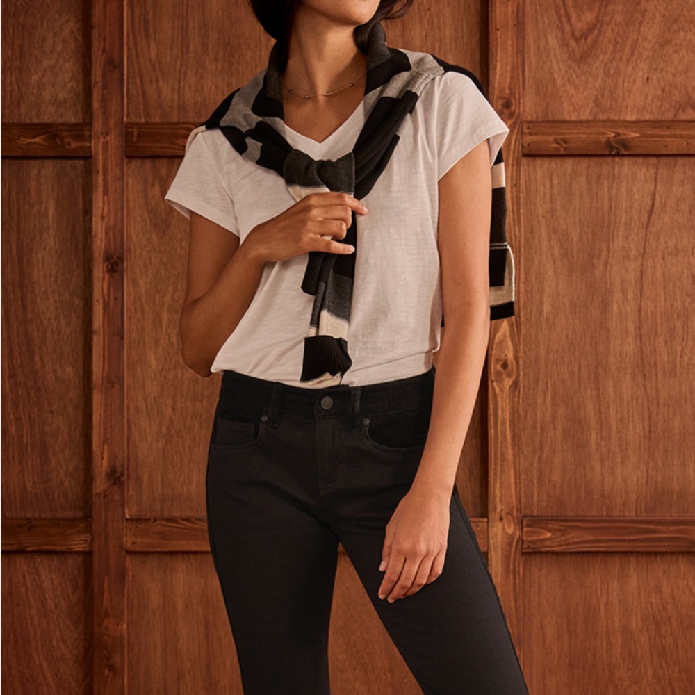 Black wide wale corduroy Jeans with tuxedo accent.